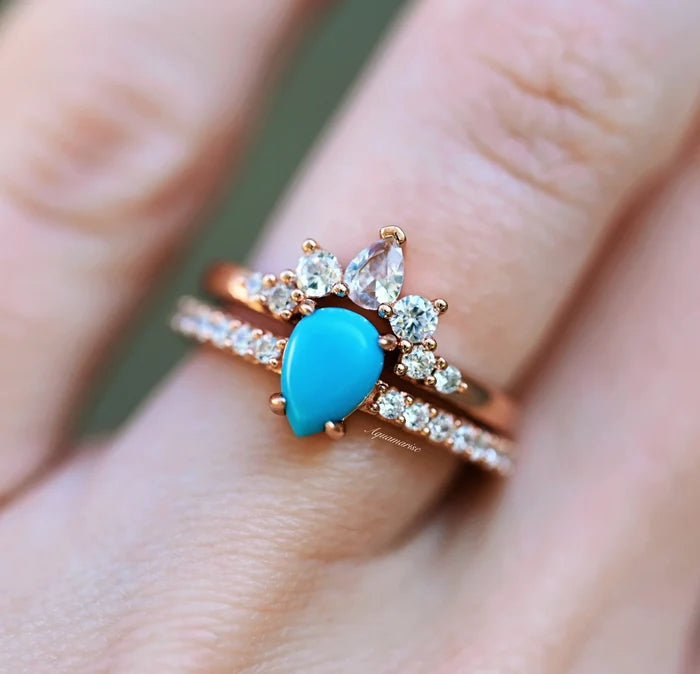 Natural Turquoise Teardrop Stacking Ring Set in 14K Rose Gold Vermeil by Aquamarise featuring a vibrant turquoise cabochon with sparkling accent stones on rose gold bands.