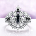 The three rings nested together with the crown band above and the star band below
