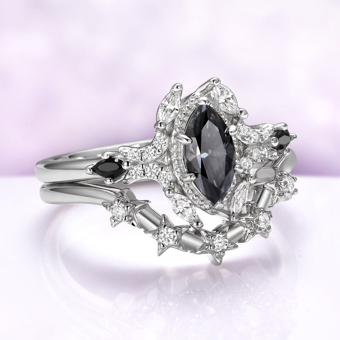 Angled view of the milgrain frame, marquise corner accents and black onyx shoulder stones