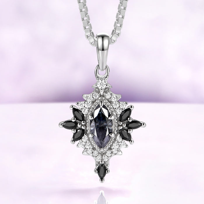 Nightbriar dark gray moissanite pendant necklace in sterling silver with natural black onyx marquise rays on a box chain
