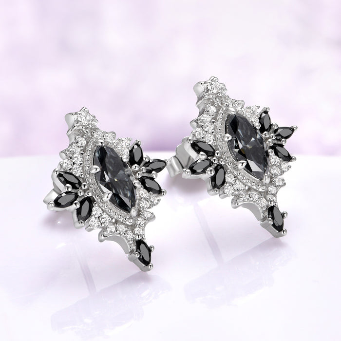 Angled view of the Nightbriar gray moissanite and black onyx stud earrings showing the milgrain frame, cubic zirconia pave and butterfly push-back
