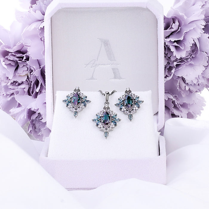 Nightbriar alexandrite pendant necklace with the matching stud earrings in the Aquamarise velvet gift box