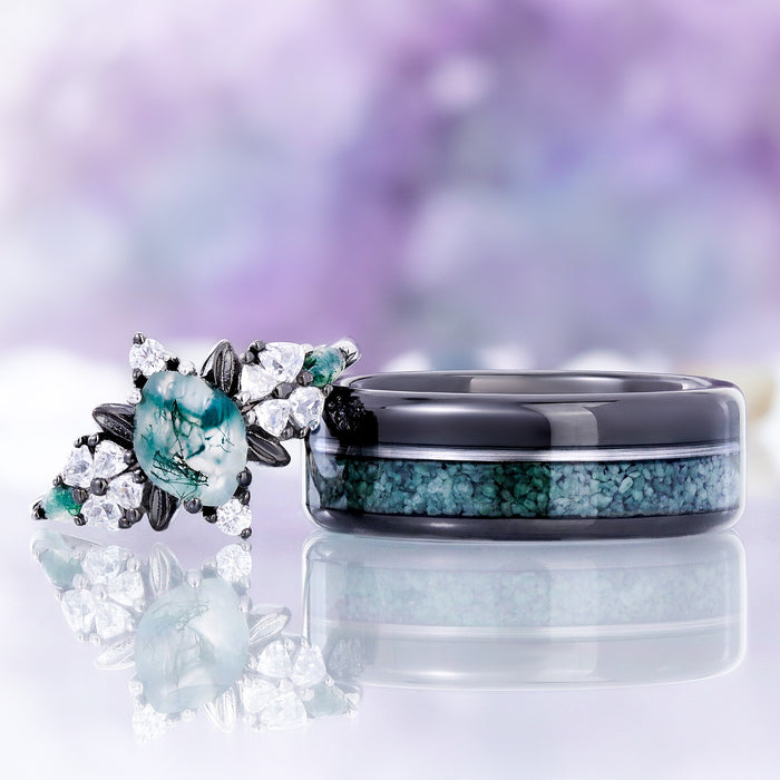 Noraleaf marquise moss agate ring in black ruthenium shown beside the matching men's off-set moss agate and black onyx tungsten band as a couples pairing