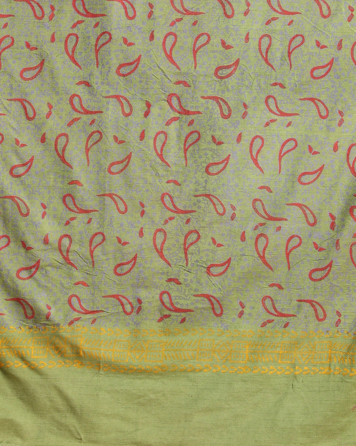 Olive green Katan silk unstitched suit set with small red and black paisley motifs, mustard yellow accents and a wide geometric printed border at the hem