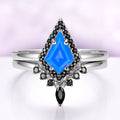 Opalescent blue sapphire black onyx ring set in sterling silver