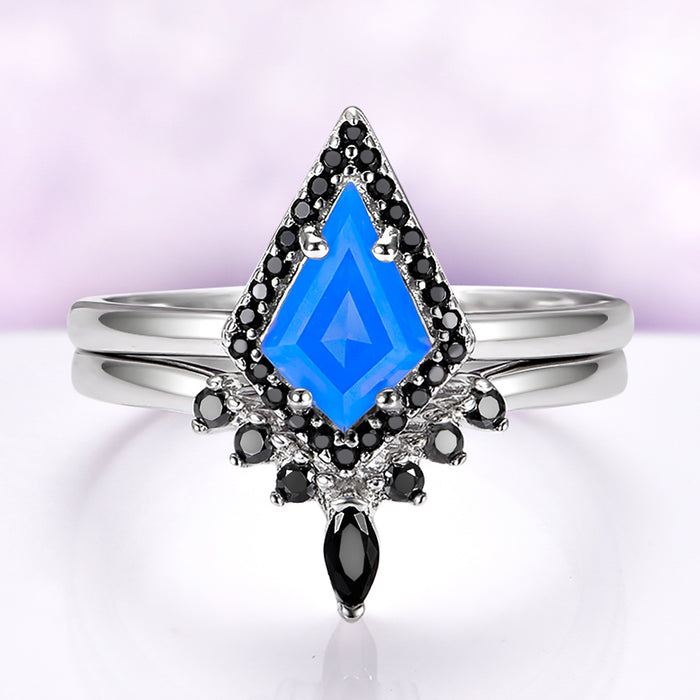 Opalescent blue sapphire black onyx ring set in sterling silver