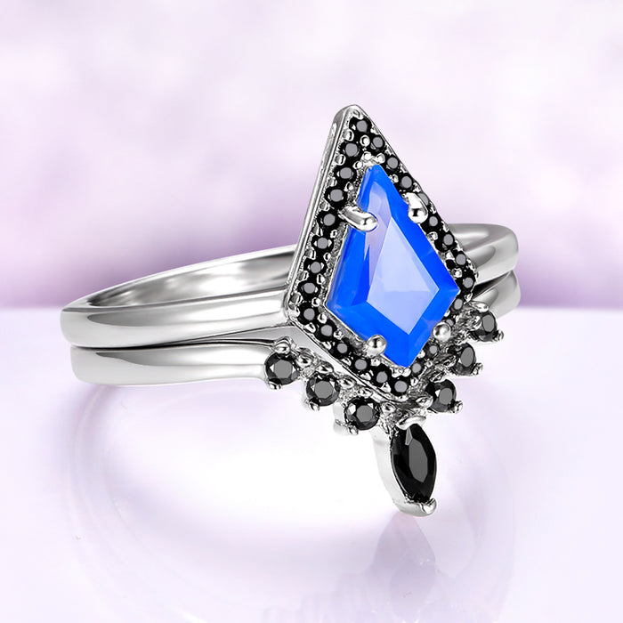 Opalescent blue sapphire and black onyx ring set