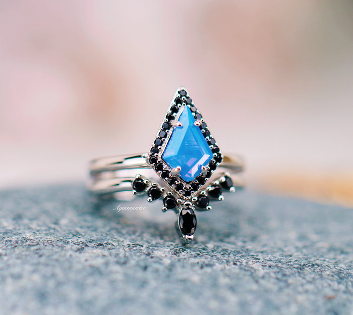 Opalescent Blue Sapphire & Black Onyx Ring Set- Sterling Silver featuring a kite-shaped blue sapphire surrounded by black onyx stones in an elegant setting by Aquamarise.
