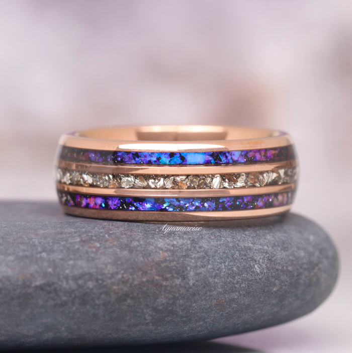 Orion Nebula™ & Crushed Diamond Couples Ring Set by Aquamarise featuring vibrant blue-purple inlay and crushed simulated diamonds in a rose gold band, symbolizing celestial elegance.