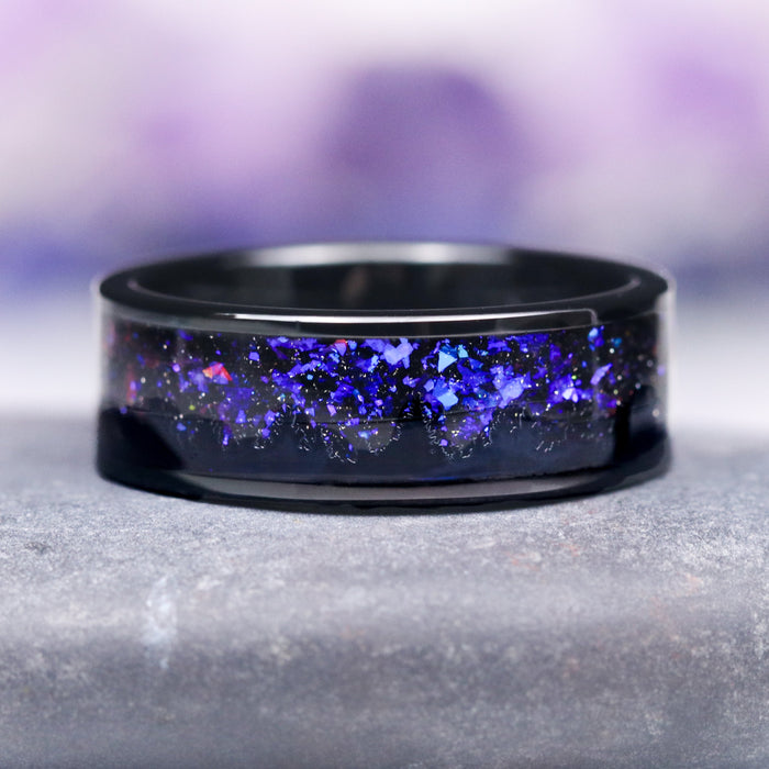 Orion Nebula™ & Trees Wedding Band- 8MM Black Tungsten ring by Aquamarise, featuring a striking inlay of shimmering blue and purple crushed stones, part of the Orion Nebula Rings® and Men’s Wedding Bands collections.