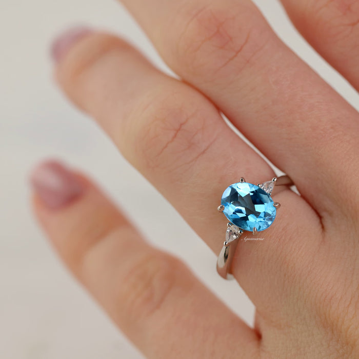 Oval Cut Natural Swiss Topaz Engagement Ring in Sterling Silver by Aquamarise, featuring a vibrant oval Swiss blue topaz center stone set in polished sterling silver, part of Sterling Silver Rings, November Birthstone, and Engagement Rings for Women collections.