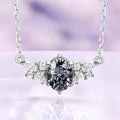 Oval gray moissanite cluster necklace in sterling silver with marquise and round clear moissanite accents