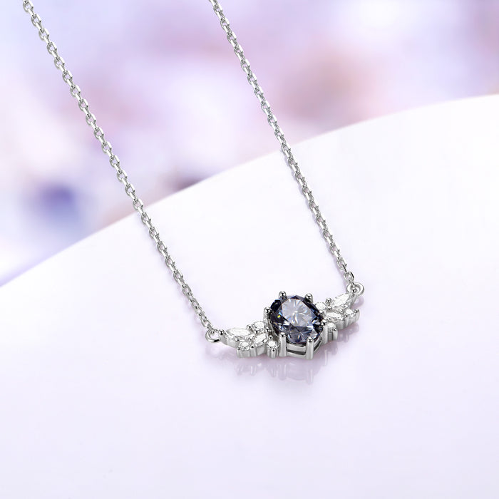 Gray moissanite cluster necklace shown at an angle with its 18 inch sterling silver cable chain