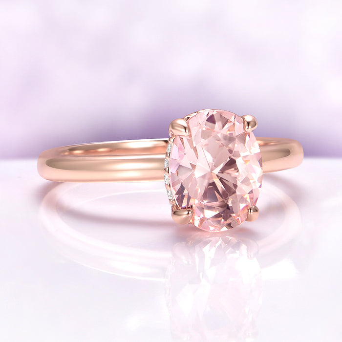Oval Solitaire Morganite Engagement Ring in 14K Rose Gold Vermeil by Aquamarise, featuring a 2-carat peach-pink oval morganite set on a polished rose gold vermeil band.