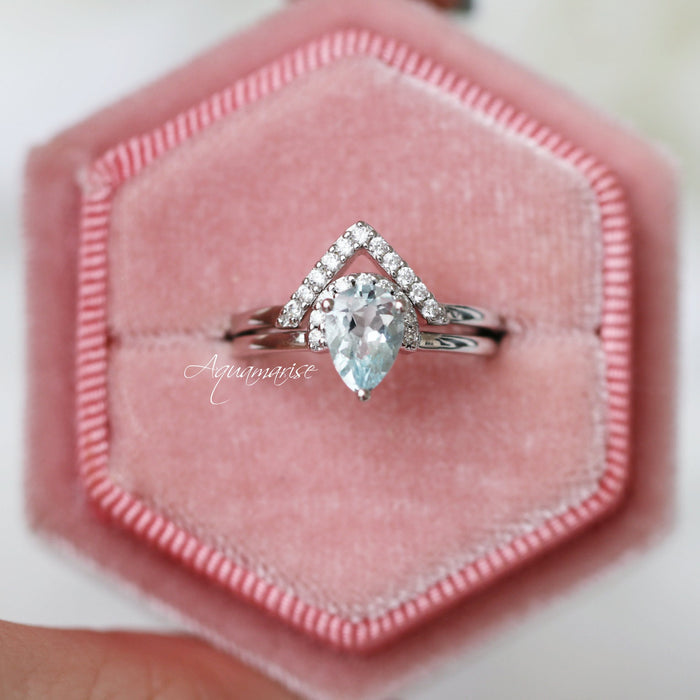 Pear Aquamarine Chevron Stacking Ring Set in Sterling Silver by Aquamarise, featuring a pear-cut aquamarine with diamond accents in a modern chevron stacking design.