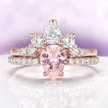 Pear Morganite Engagement Ring Set in 14K Rose Gold Vermeil by Aquamarise, featuring a pear-shaped morganite and sparkling white stones in a fantasy-inspired rose gold design.