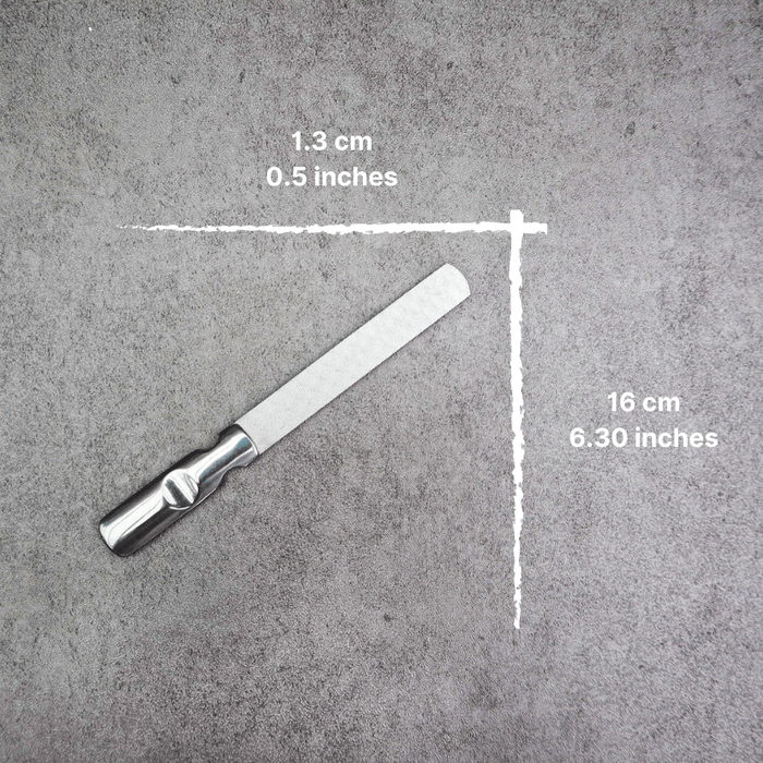 Pet grooming kit nail file with measurements on a gray background