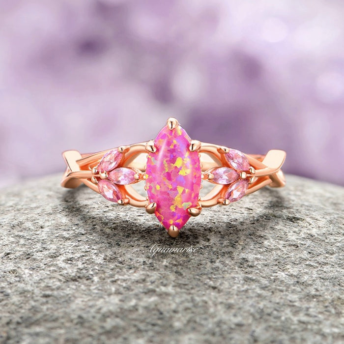 Pink Fire Opal & Sapphire Celtic Knot Ring- 14K Rose Gold Vermeil featuring a marquise pink fire opal centerpiece with simulated pink sapphire accents set on an intricate Celtic knot band by Aquamarise, ideal for nature-inspired engagement jewelry.