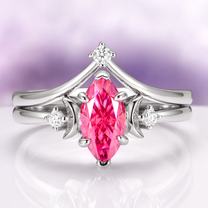 Pink Moissanite Crescent Moon Engagement Ring Set in Sterling Silver featuring a vivid marquise-cut pink moissanite center stone surrounded by crescent moon and diamond accents on polished sterling silver bands by Aquamarise Gold, part of Sterling Silver Rings and Fantasy-Inspired Engagement Rings collections.