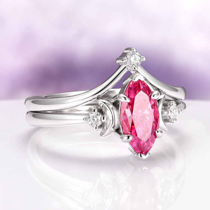 Pink Moissanite Crescent Moon Engagement Ring Set in Sterling Silver by Aquamarise Gold, featuring a vivid marquise-cut pink moissanite center stone with crescent moon details and sparkling accent stones on polished sterling silver bands, part of Sterling Silver Rings, Engagement Rings for Women, and Fantasy-Inspired collections.