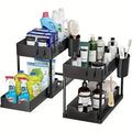 Black multi-tiered organizer with cleaning supplies and toiletries on a white background