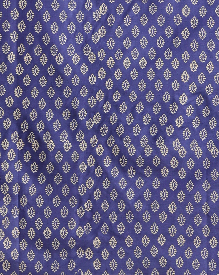 Purple katan silk unstitched suit set hand block printed with small off-white and pale pink botanical motifs, with a panelled dupatta ending in a short self fringe.