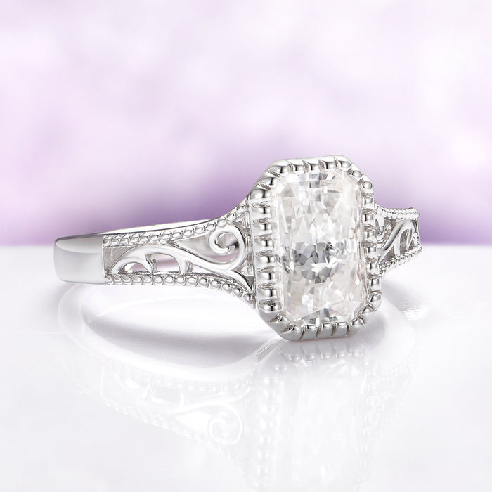 Lab Grown Diamond Engagement Ring in 14K White Gold (IGI Certified) by Aquamarise Gold, featuring a radiant-cut diamond with intricate filigree detailing on a polished white gold band.