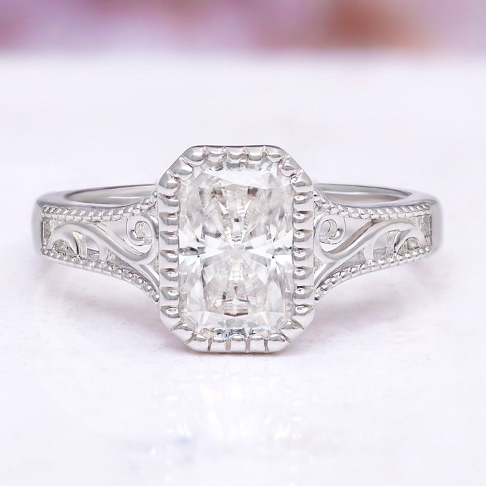 Lab Grown Diamond Engagement Ring in 14K White Gold (IGI Certified) by Aquamarise Gold, featuring a radiant-cut diamond with intricate vintage-style filigree detailing on the band.