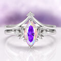 Rainbow Moissanite Crescent Moon Engagement Ring Set in Sterling Silver by Aquamarise Gold, featuring a marquise-cut rainbow moissanite center stone with pastel violet, blue, and gold flashes, set in polished sterling silver, part of Sterling Silver Rings and Moissanite Engagement Rings collections.