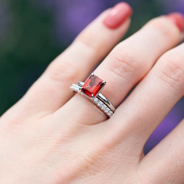 Raspberry Tourmaline Engagement Ring Set- Sterling Silver by Aquamarise, featuring a radiant emerald-cut raspberry red tourmaline with a sparkling diamond-accented band on a polished sterling silver ring.