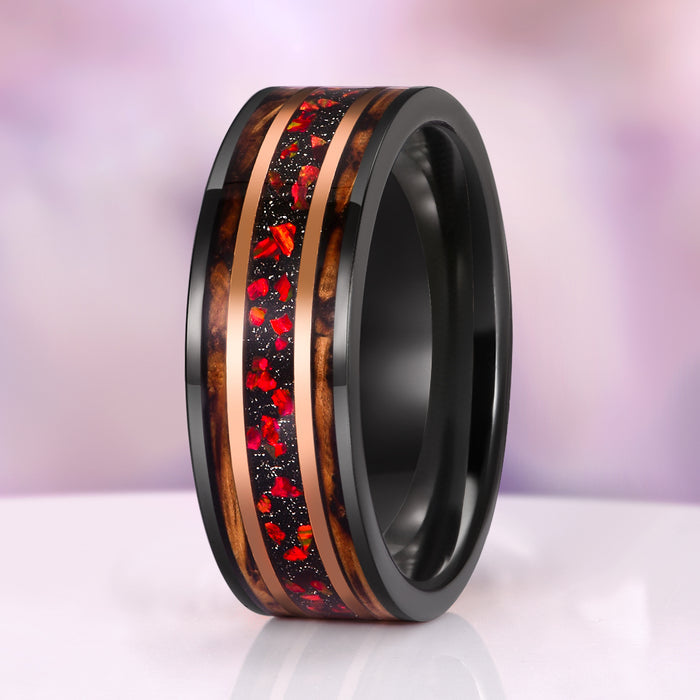 Garnet & Red Fire Opal Whiskey Barrel Couples Ring Set by Aquamarise, highlighting a black-finished band with vibrant garnet and red fire opal inlay framed by polished whiskey barrel wood stripes, part of Matching Couples' Rings and Gemstone Rings collections.