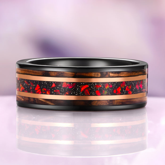 Garnet & Red Fire Opal Whiskey Barrel Couples Ring Set featuring a black-finish band with rich whiskey barrel wood and a vibrant red fire opal and garnet inlay, crafted by Aquamarise, part of Matching Couples' Rings and January and October Birthstone Jewelry collections.