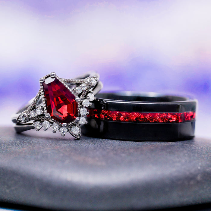 Lilith Coffin Cut Natural Red Garnet Couples Ring Set featuring a bold coffin-cut garnet with diamond accents and a black band inlaid with red garnet, by Aquamarise.