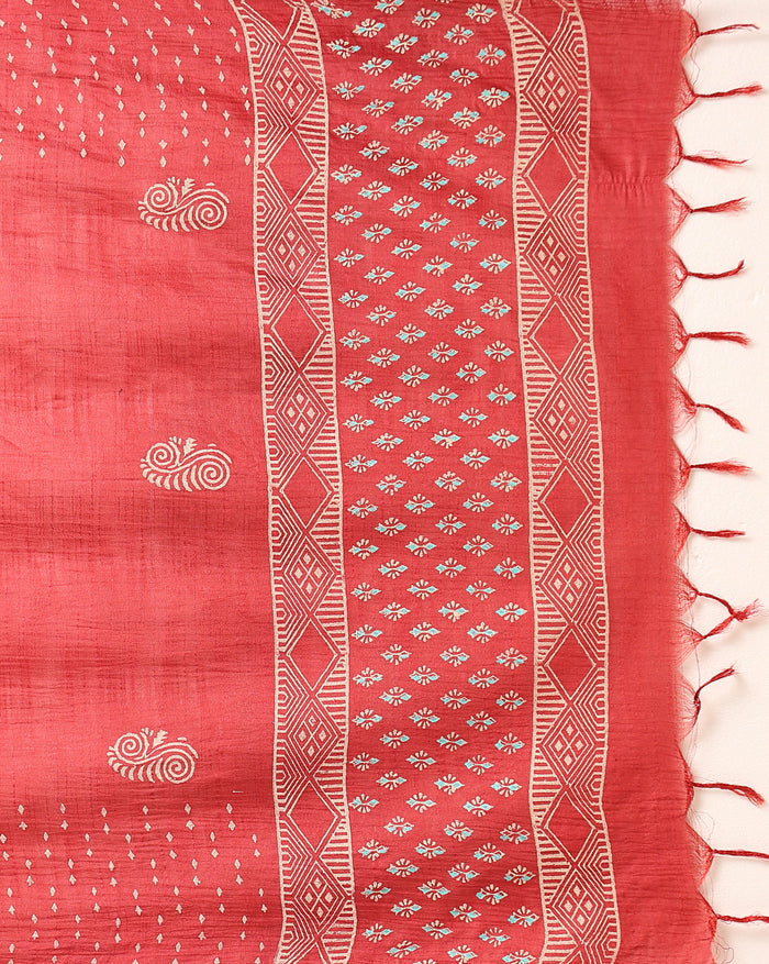 Bright red katan silk unstitched suit set hand block printed with small angular teal and off-white sprigs and geometric bands at the ends of the length.