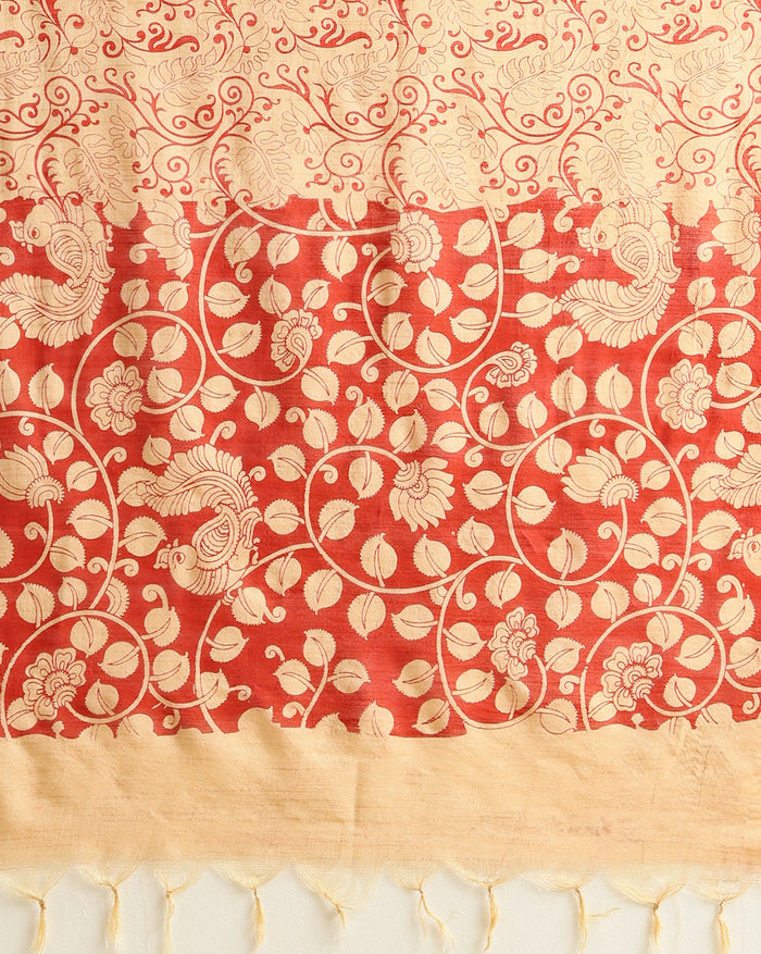 Red Katan silk unstitched suit set hand block printed with cream peacocks and floral vines in an all-over repeat, with a fringed dupatta and a horizontal patterned band on the bottom piece.