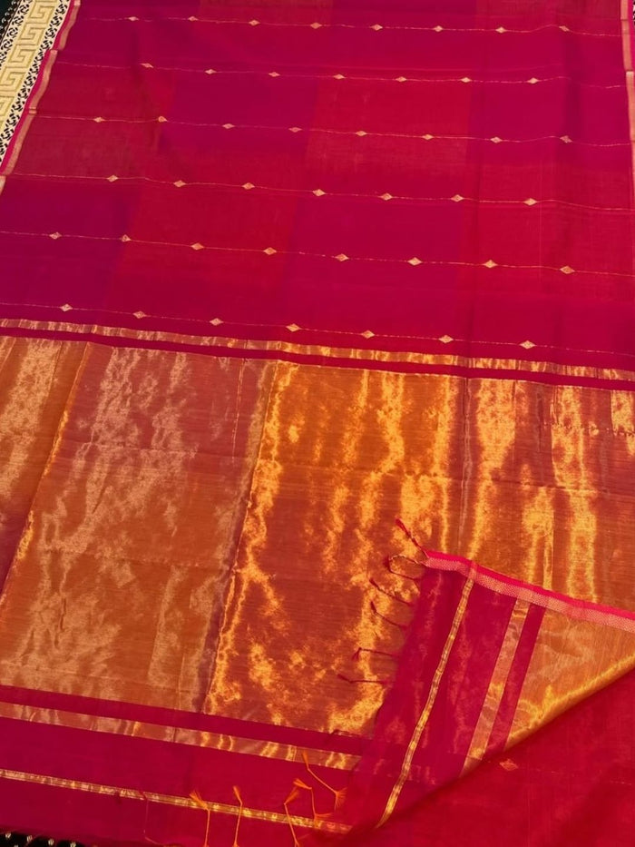 Magenta-red Maheshwari silk saree with small zari buta and a wide golden yellow zari border, handwoven in Maheshwar