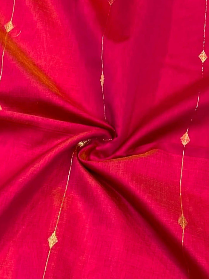 Magenta-red Maheshwari silk saree with small zari buta and a wide golden yellow zari border, handwoven in Maheshwar