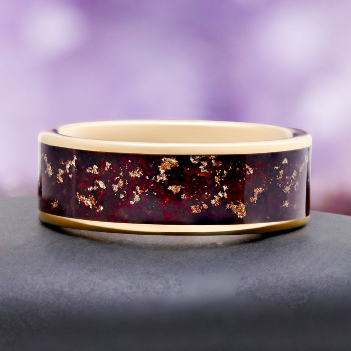Close-up of the crushed rose petal and gold leaf inlay