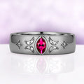 6mm black ruthenium wedding band with a bezel-set marquise lab-grown ruby flanked by pave crescent moons and four-point stars