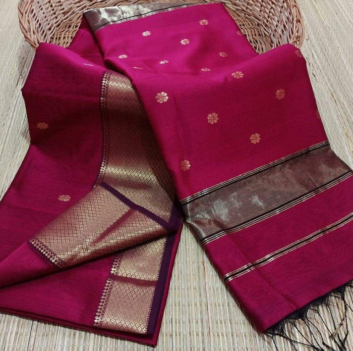 Handloom Maheshwari silk saree in ruby red, flower buti scattered across the body, with a wide golden zari border