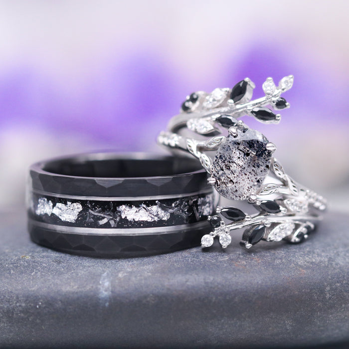 Black Moissanite Leaf Ring Guard in 14K White Gold by Aquamarise Gold, showcasing a delicate vine and leaf motif accented with black moissanites alongside a complementary dark band with textured silver inlay, featured in Solid Gold Engagement Rings and Lovers of the Dark™ collections.