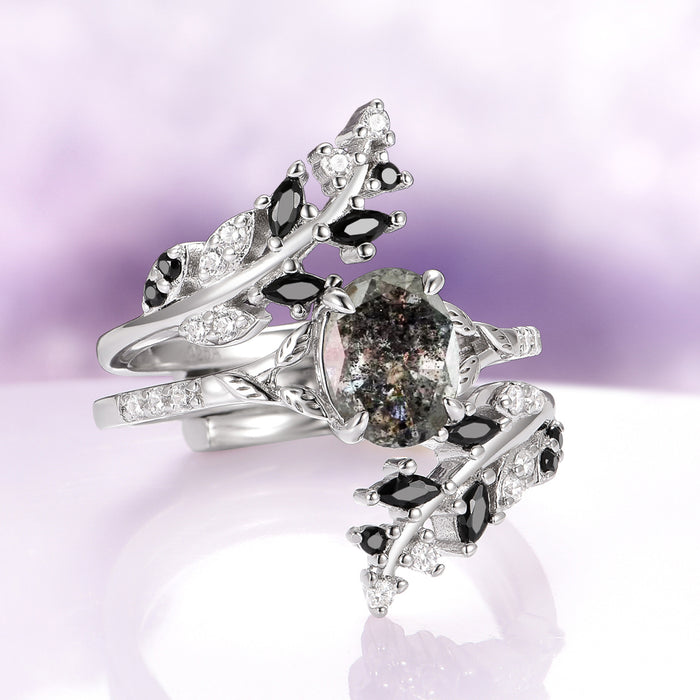 Black Moissanite Leaf Ring Guard in 14K White Gold by Aquamarise Gold showcasing an elegant vine-inspired design with marquise-cut black moissanites and sparkling white accents, part of the Solid Gold Engagement Rings and Lovers of the Dark™ collections.