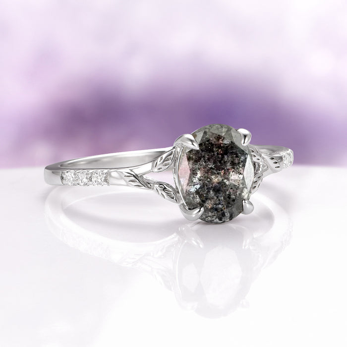 Oval Cut Natural Herkimer Diamond Engagement Ring in 14K White Gold by Aquamarise Gold, featuring an oval Herkimer diamond with natural inclusions set in a delicately engraved band with subtle leaf motifs, from the Nature-Inspired Engagement Rings and Solid Gold Engagement Rings collections.