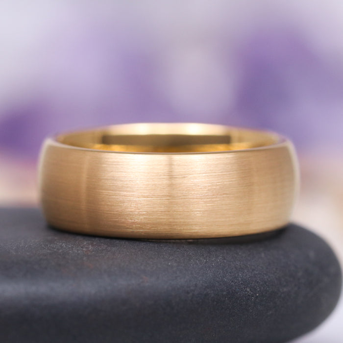Satin Wedding Band in 14K Solid Yellow Gold (8MM) by Aquamarise Gold showcases a wide 8mm band with a soft satin-brushed finish, offering a timeless and comfortable design for men’s and women’s solid gold rings collections.