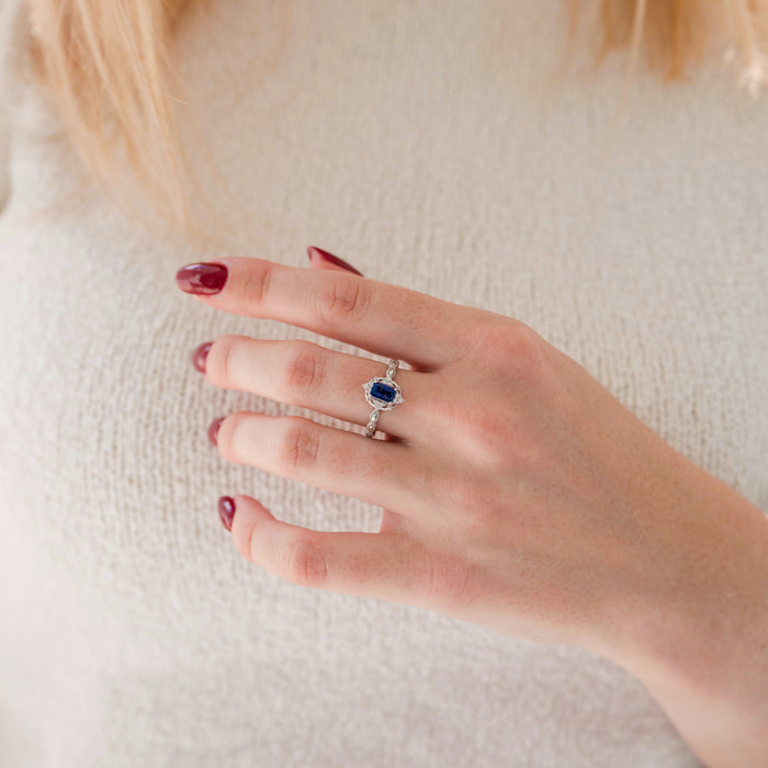 Starry Night (Sandstone) Engagement Ring in 14K White Gold by Aquamarise Gold, featuring an emerald-cut deep blue Galaxy Sandstone on a fine diamond-accented band.