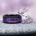 Crushed Amethyst Wedding Band- 8MM Black Tungsten featuring a hammered black tungsten band with vibrant purple crushed amethyst inlay, displayed alongside a silver ring with amethyst and clear stones, styled by Aquamarise from their Men's Wedding Bands and February Birthstone collections.