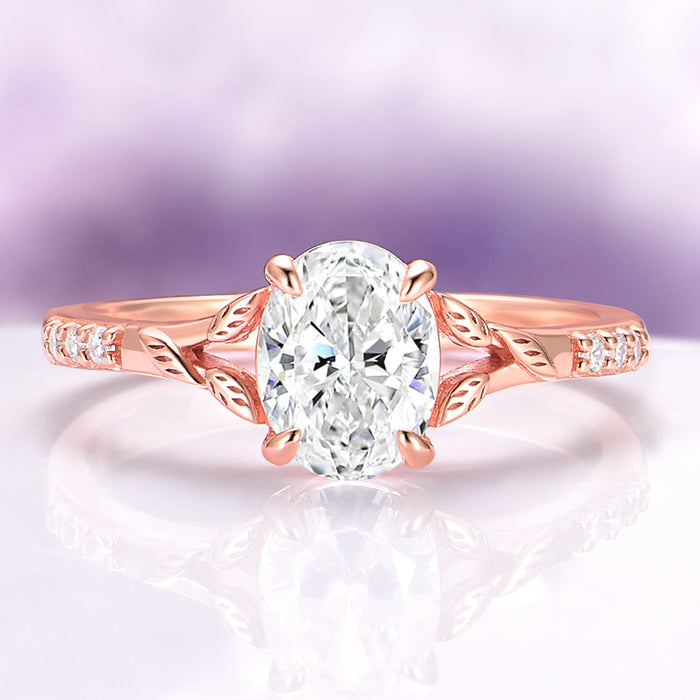 Lab-Grown Diamond Leaf Engagement Ring in 14K Solid Rose Gold (IGI Certified) by Aquamarise Gold, featuring an oval lab-grown diamond center with delicate vine and leaf carvings on the rose gold band, part of nature-inspired and solid gold engagement rings collections.