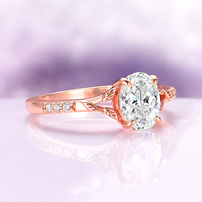 Lab-Grown Diamond Leaf Engagement Ring in 14K Solid Rose Gold (IGI Certified) by Aquamarise Gold, showcasing an oval lab-grown diamond centerpiece with delicate leaf and vine engravings on the rose gold band, featured in nature-inspired and solid gold engagement rings collections.