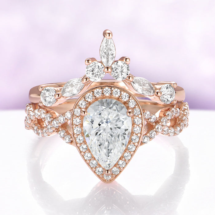 Simulated Diamond Engagement Ring Set in 14K Rose Gold Vermeil by Aquamarise, featuring a pear-cut simulated diamond halo on a twisted pave band with a marquise crown band.