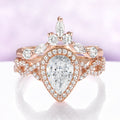 Simulated Diamond Engagement Ring Set in 14K Rose Gold Vermeil by Aquamarise, featuring a pear-cut simulated diamond halo on a twisted pave band with a marquise crown band.
